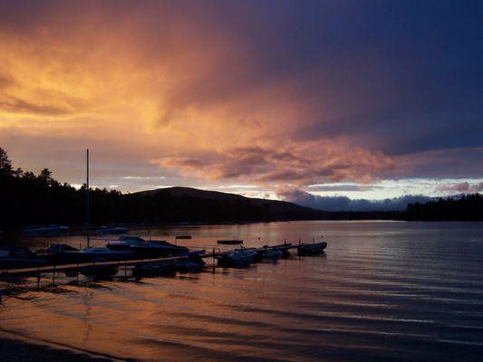 Sunset from our beach overlooking our long dock