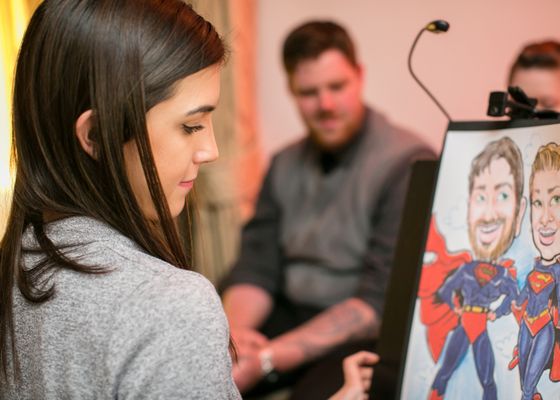 Super hero caricatures for United Way of Bucks Co. Event. Photo Credit: Marco Calderon