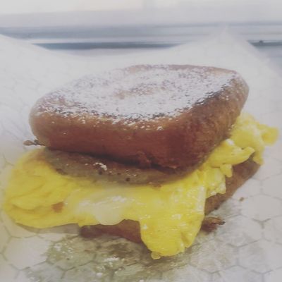 French toast sandwich with beef sausage egg and cheese