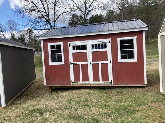 The shed I purchased. This is a photo from the lot.