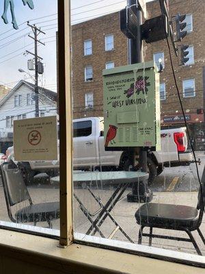 Looking out front window around 7:30 AM They just put the tables and chairs out.