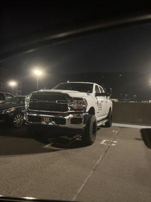 Parking of company car in 2 spaces that are labeled "C" for compact