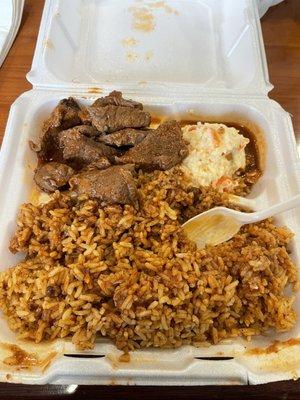 Arroz con gandules (yellow rice with pigeon peas)/ Potato Salad/ Carne Guisado (Stewed Beef)