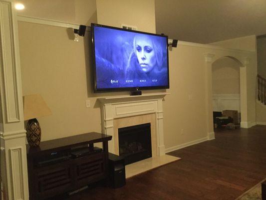 70 Inch Sharp Install. Hide the Wires, Fireplace. Install Speaker Mounts, Speakers, Point to Point Sound Calibration.