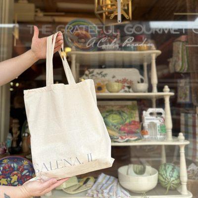 Galena, Illinois Canvas Tote bag in front of shop window.