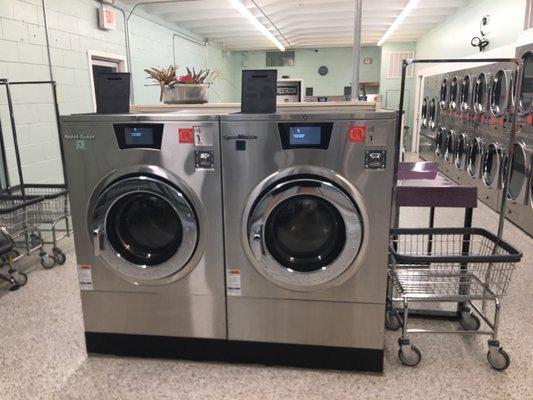 Two brand new 60 pound washers