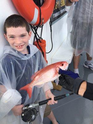 Our friend's son caught a snapper first time fishing. He is a born fisherman!