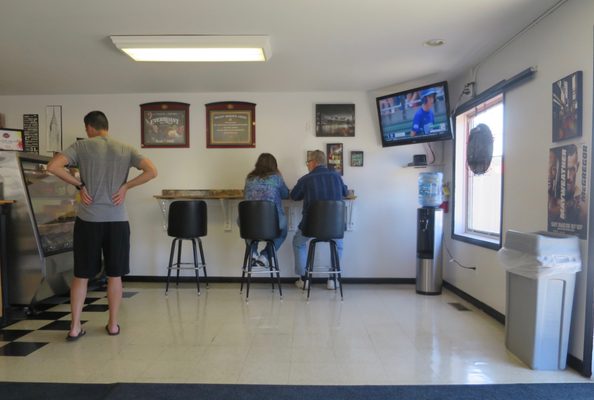 TV and a little bar seating up front