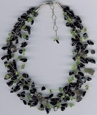 7 Strands of peridot & black tourmaline on a rose gold vermeil for an elegant fall necklace $180.00