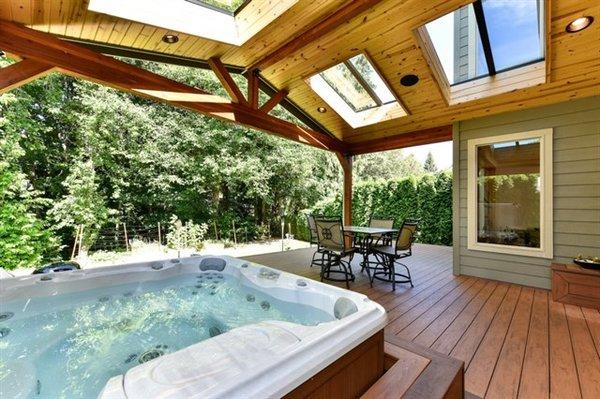 Covered deck with hot tub - Bellingham, WA home sale.