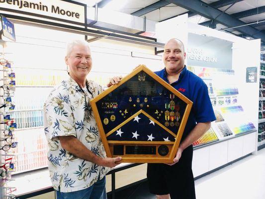 Our manager Paul (with a military veteran) who needed his shadow box glass repaired