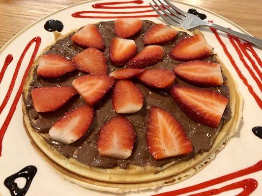 Thin waffle with strawberries and  Nutella