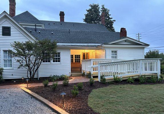 The back entrance of the house with an accessible ramp.