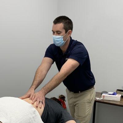 Dr. Beaudreau working on lower back.