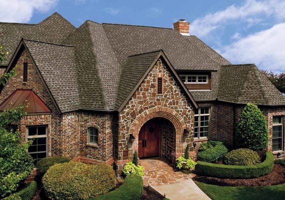 new construction home with asphalt shingle roof