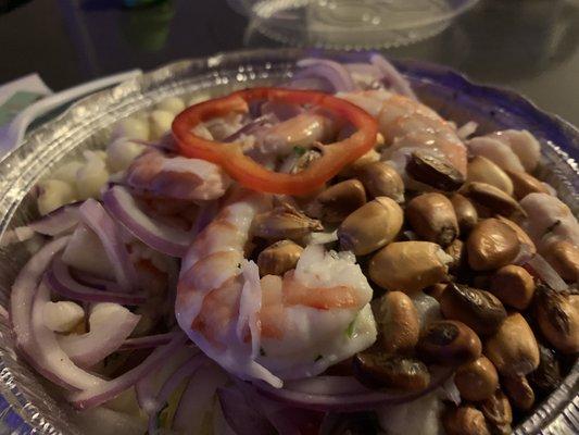 Ceviche Mixto. I'm not a fan of corn nuts but the food was so amazing and flavorful.