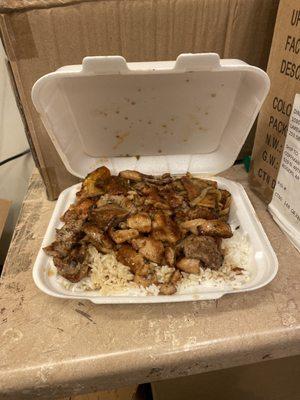 Number 5, Chicken and Beef Combo. With white rice and Potatoes.