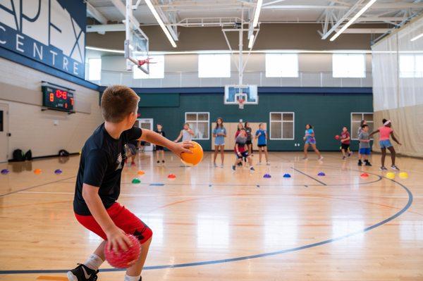 Summer Camp kids playing dodgeball