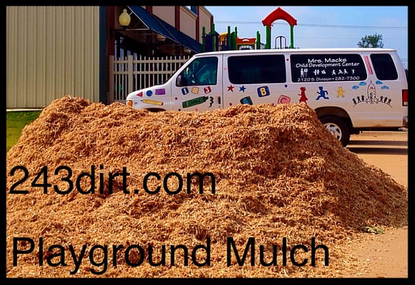 Playground Mulch delivered in Edmond OK. OKDHS Approved, Impact Resistant Child Care Center Mulch. Topsoil, Gravel, Stone in OKC