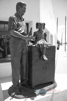 Statue of Bill Kloster in the front of the Dublin Dr Pepper Museum.