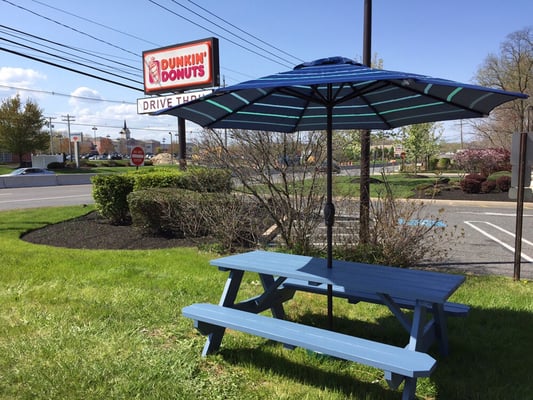 Our outdoor seating area, right by our next-door, neighbor Dunkin' Donuts!