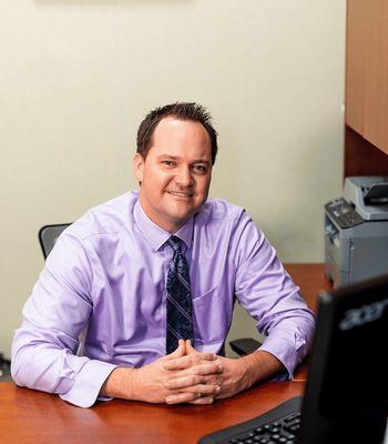 Dr. David Jenkins at his desk