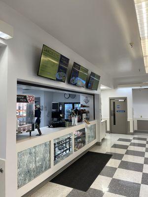 Lakeland bistro - Ordering counter and digital menu displays.