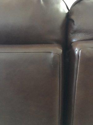 Beautifully repaired leather sectional back!