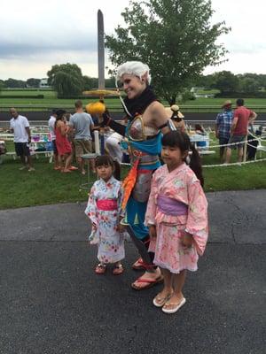 Cosplayer and darling kids in kimonos