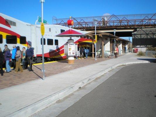 Passengers boarding the Rail Runner at the Los Ranchos Journal Center Station