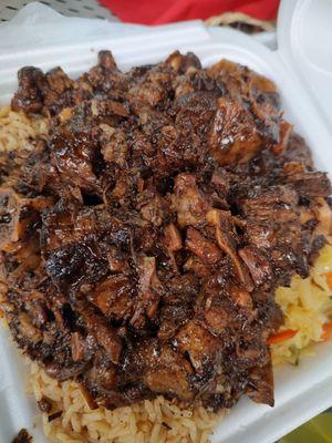 #6. Braised Oxtail Combo  oxtails, cabbage and rice and beans