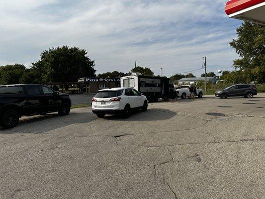 Rescue parking lot party (with the truck waiting to  hook up to the camper)