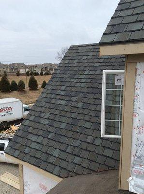 We installed Grand Manor Designer shingles in Stonegate Grey on this home.