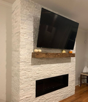 Fireplace installation with shelf and tiles