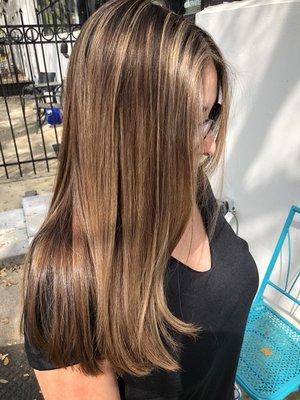 Color, highlights and a Brazilian Blowout for maximum smoothness.