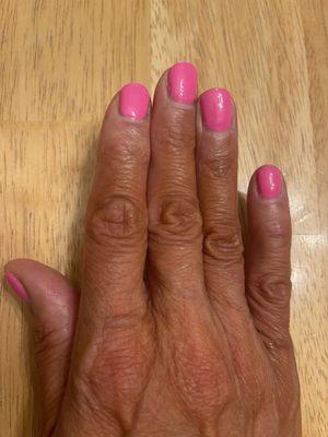 Manicure with gaps at base of nail. Polish wasn't applied close enough to the cuticle.