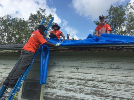 A few members of our disaster relief team help to fix a roof after Hurricane Harvey. (Victoria, Texas 2017)