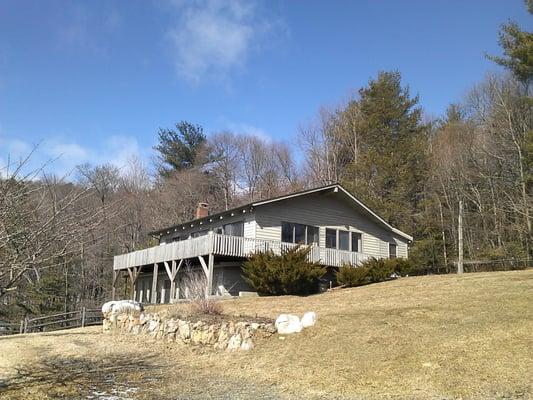 Near Blue Ridge Parkway and Stone Mountain: Passive Solar home 2 baths 2 bedrooms open floor plan. $158,000