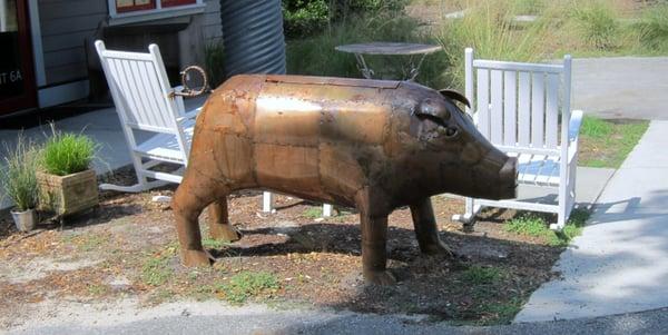 Metal Pig in front of the store