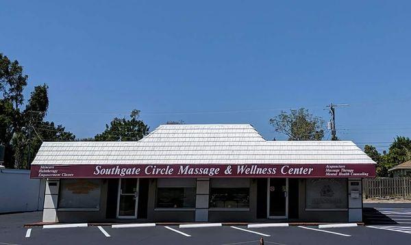 The view of Southgate Circle Massage & Wellness Center from the park in the middle of the traffic circle.