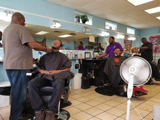 Them three boys cuttn' hair and crackin' jokes, my ribs hurt. Their barber skills #OnPoint. Might have to fly down here just for a hair cut.