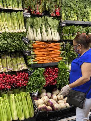 A customer looking at our fresh and organic produce.