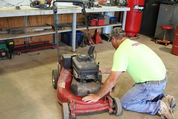 Lawn mower maintenance and repair