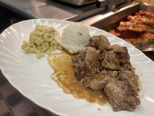 Pork adobo comes with rice and Mac salad