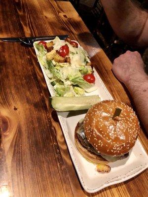 Burger with side Caesar salad