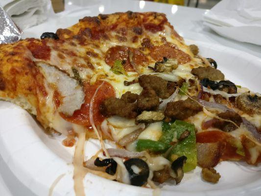 Slice of combo pizza