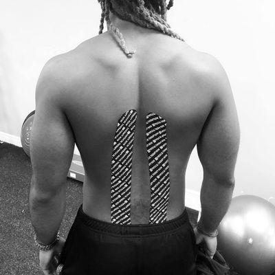 Ice pack, STEM, rock tape to alleviate back pain. Always remember to gently warm up & stretch muscles before working out