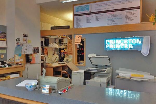 Front desk with custom neon sign