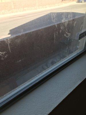 Dirty window by front door