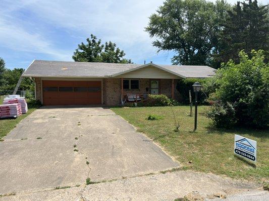 Removal of old shingles.